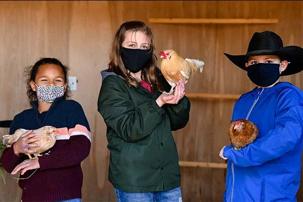 Children with chickens