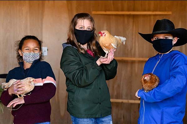 Children with chickens