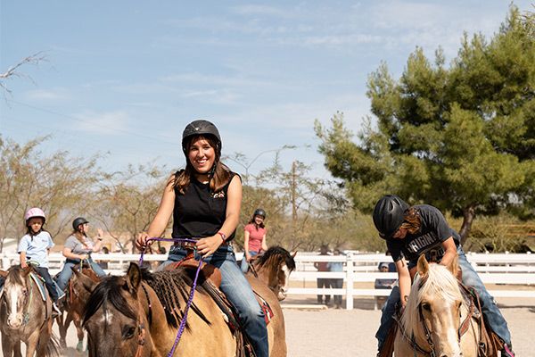 People riding horses