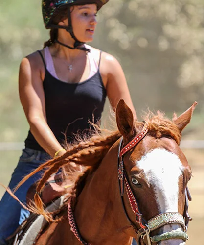 Girl Horseback Riding