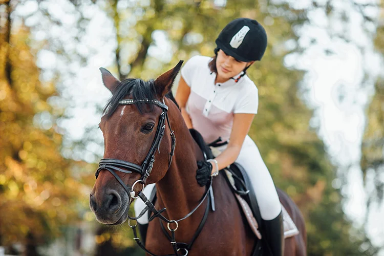 Female Jockey Horseback Riding